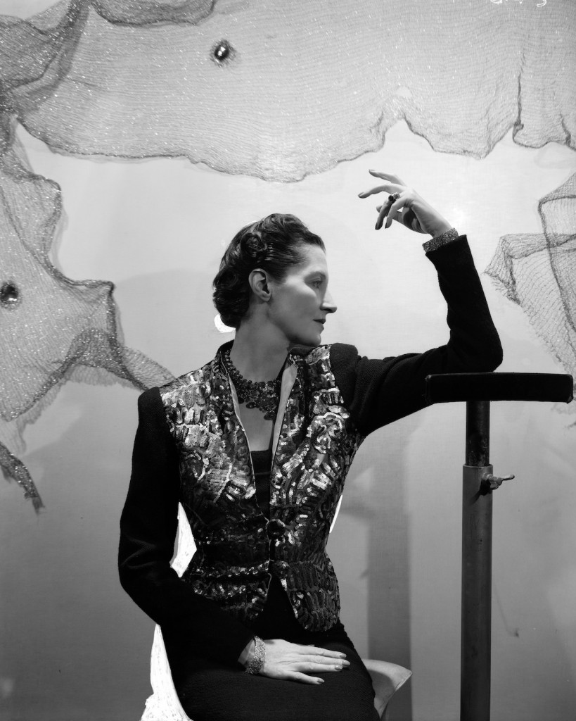 Daisy Fellowes (1890-1962), Paris Editor of American Harper’s Bazaar, wearing her commissioned ‘Collier Hindou’ or ‘Tutti Frutti’ Cartier necklace and a sequin jacket by Schiaparelli, photograph by Cecil Beaton, 1937.  Courtesy of The Cecil Beaton Studio Archive, Sotheby’s